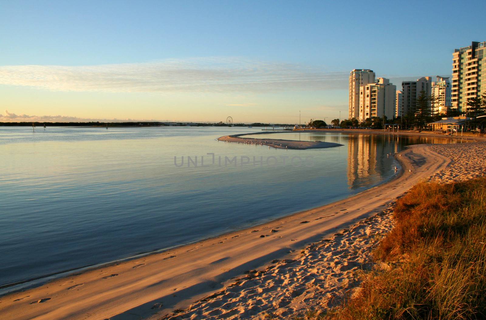 Coastal hamlet and lagoon bathed in the early morning light.