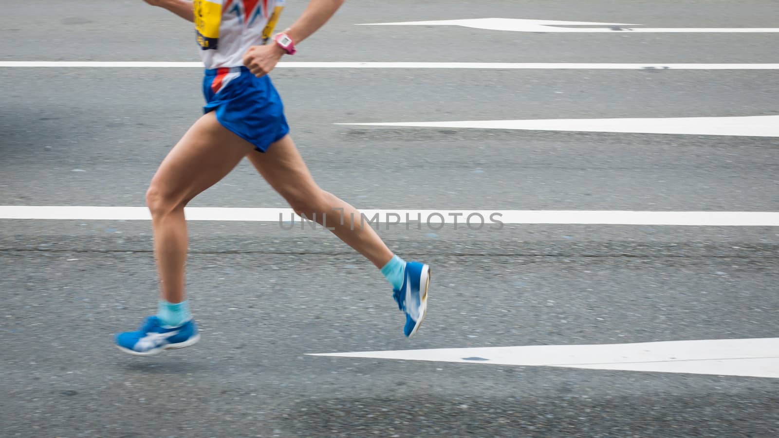 Marathon runners on the Road. Motion blurred