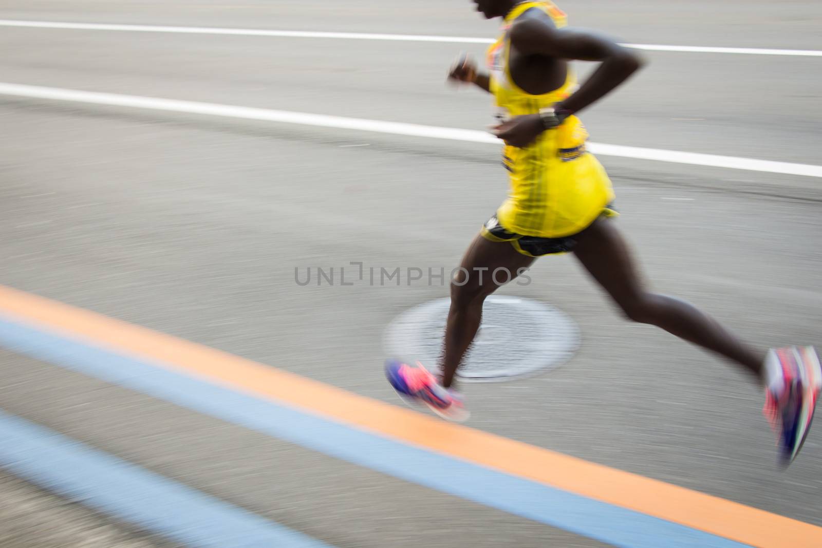 Marathon runners on the Road. Motion blurred