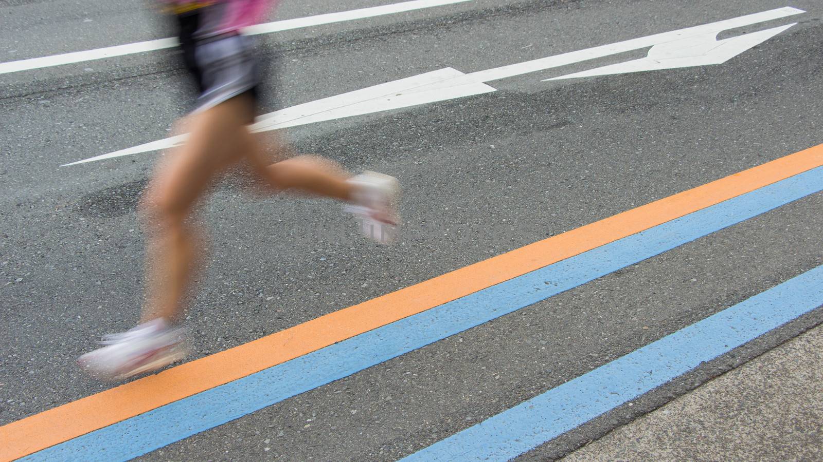 Marathon runners on the Road. Motion blurred