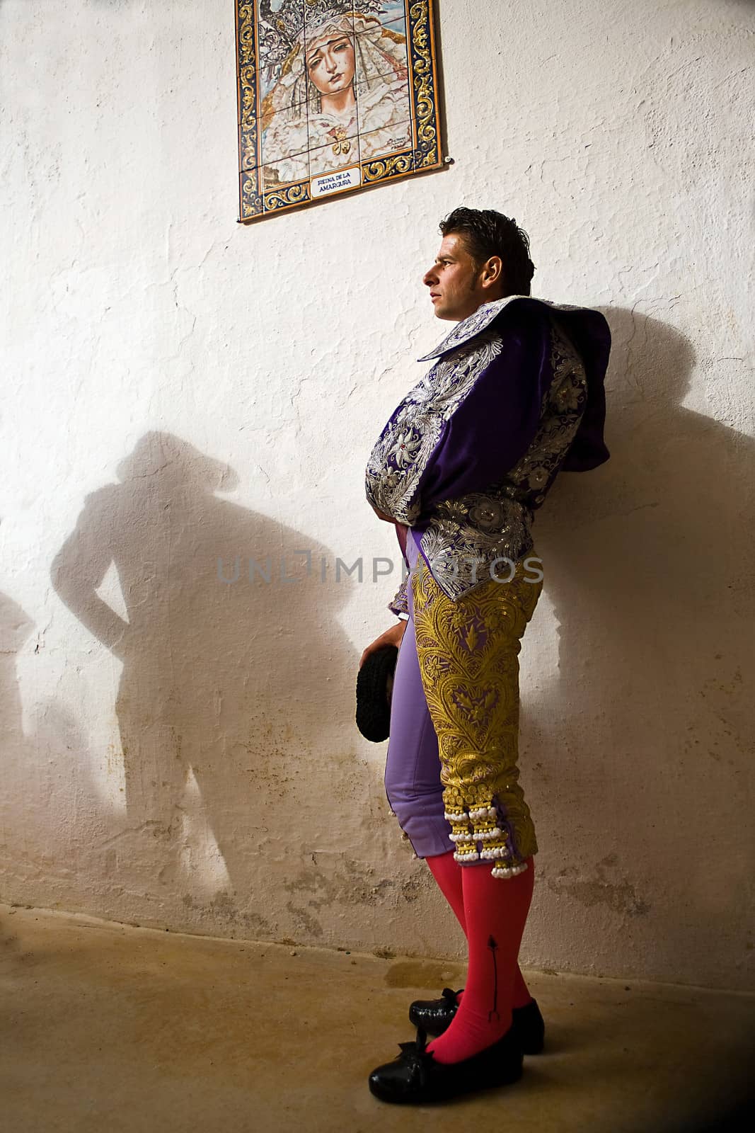 The Spanish Bullfighter David Valiente waiting in the alley of the plaza de toros de Jaen, Spain