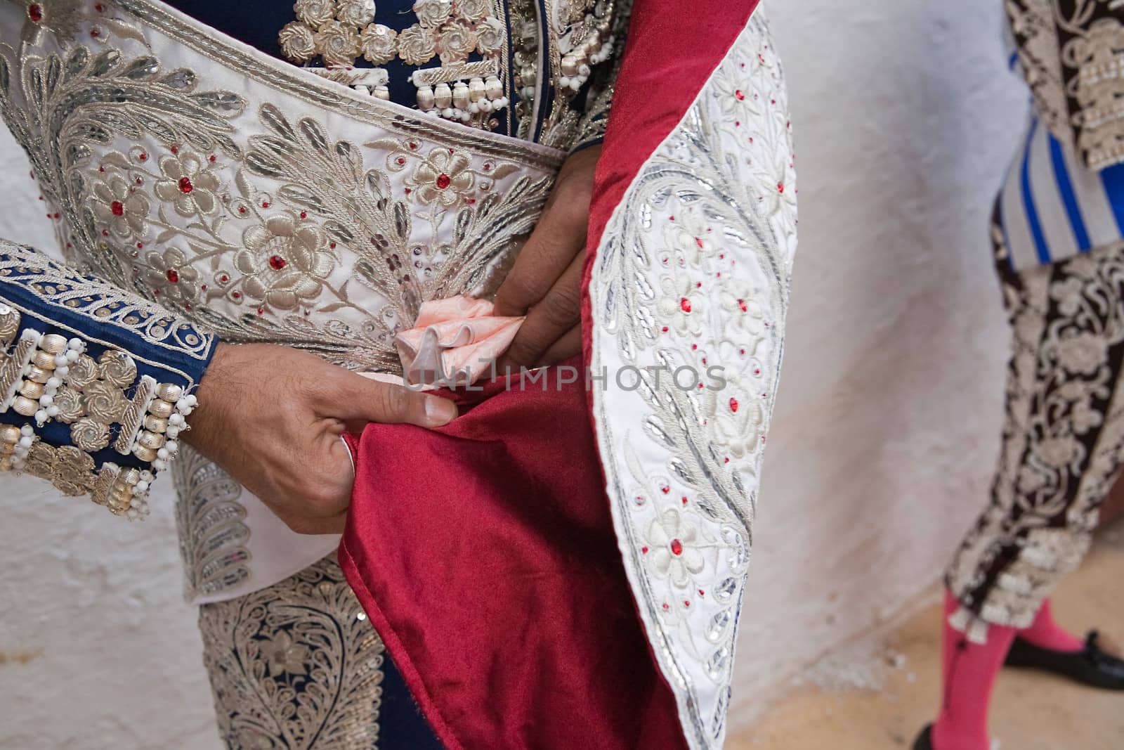 Bullfighter getting dressed for the paseillo or initial parade. Taken at Linares bullring before a bullfight, Jaen, Spain, 17 october 2008