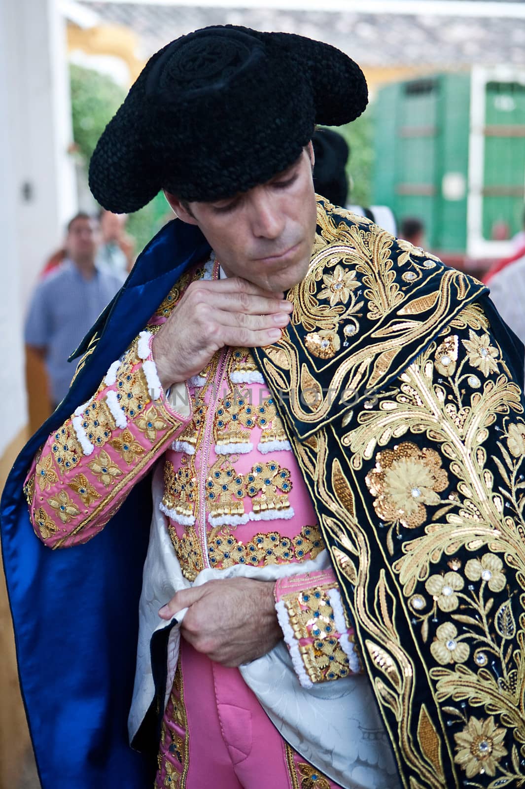 The spanish bullfigher Jose Tomas getting dressed for the paseillo or initial parade. Taken at Linares bullring before a bullfight, Linares, Spain, 29 august 2011