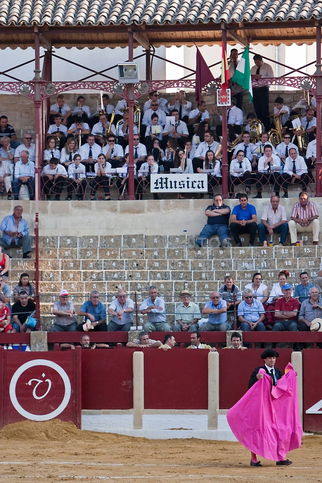 Spectators and music band in a bullfight in Ubeda, province of Jaen, Spain