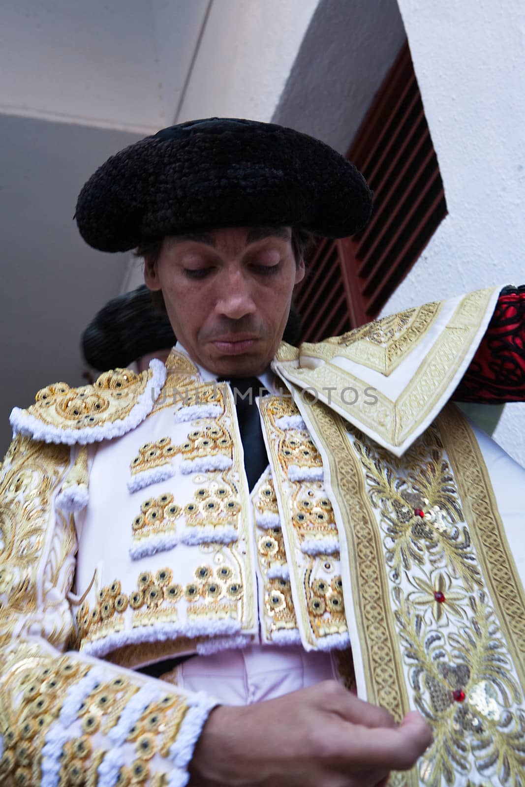 The spanish bullfighter Curro Diaz  getting dressed for the paseillo or initial parade. Taken at Linares bullring before a bullfight, Jaen, Spain, 16 october 2011