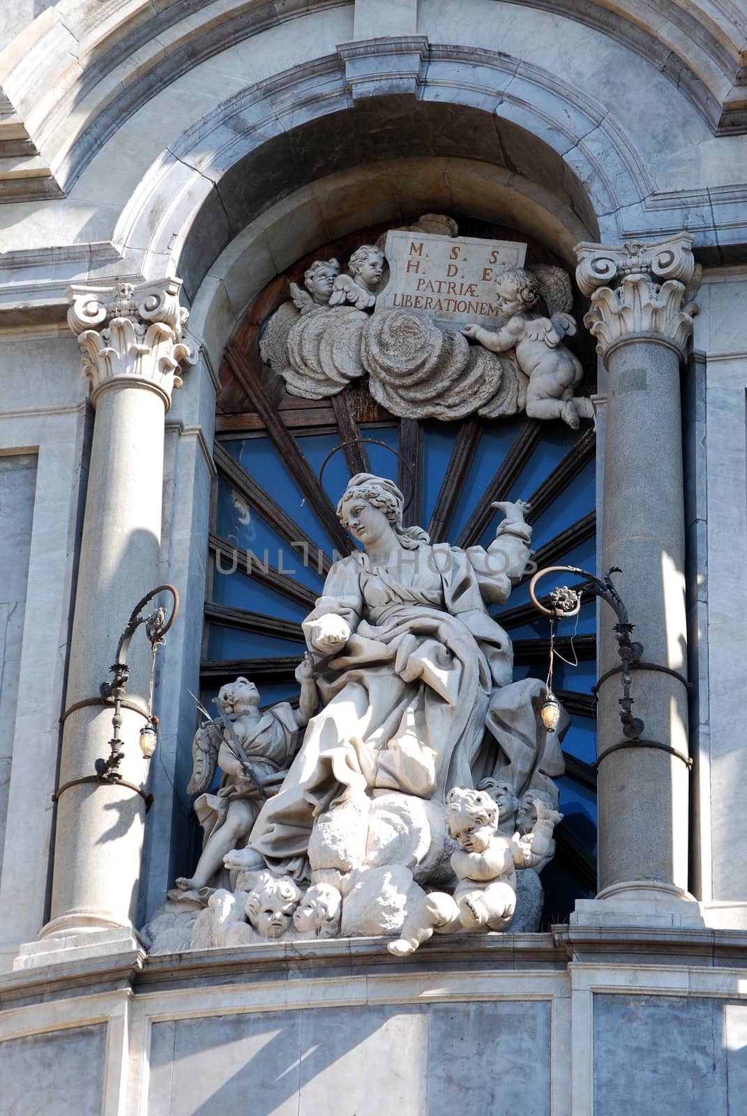 A detail of the St. Agata's statue on the facade of the Cathedral of Catania.