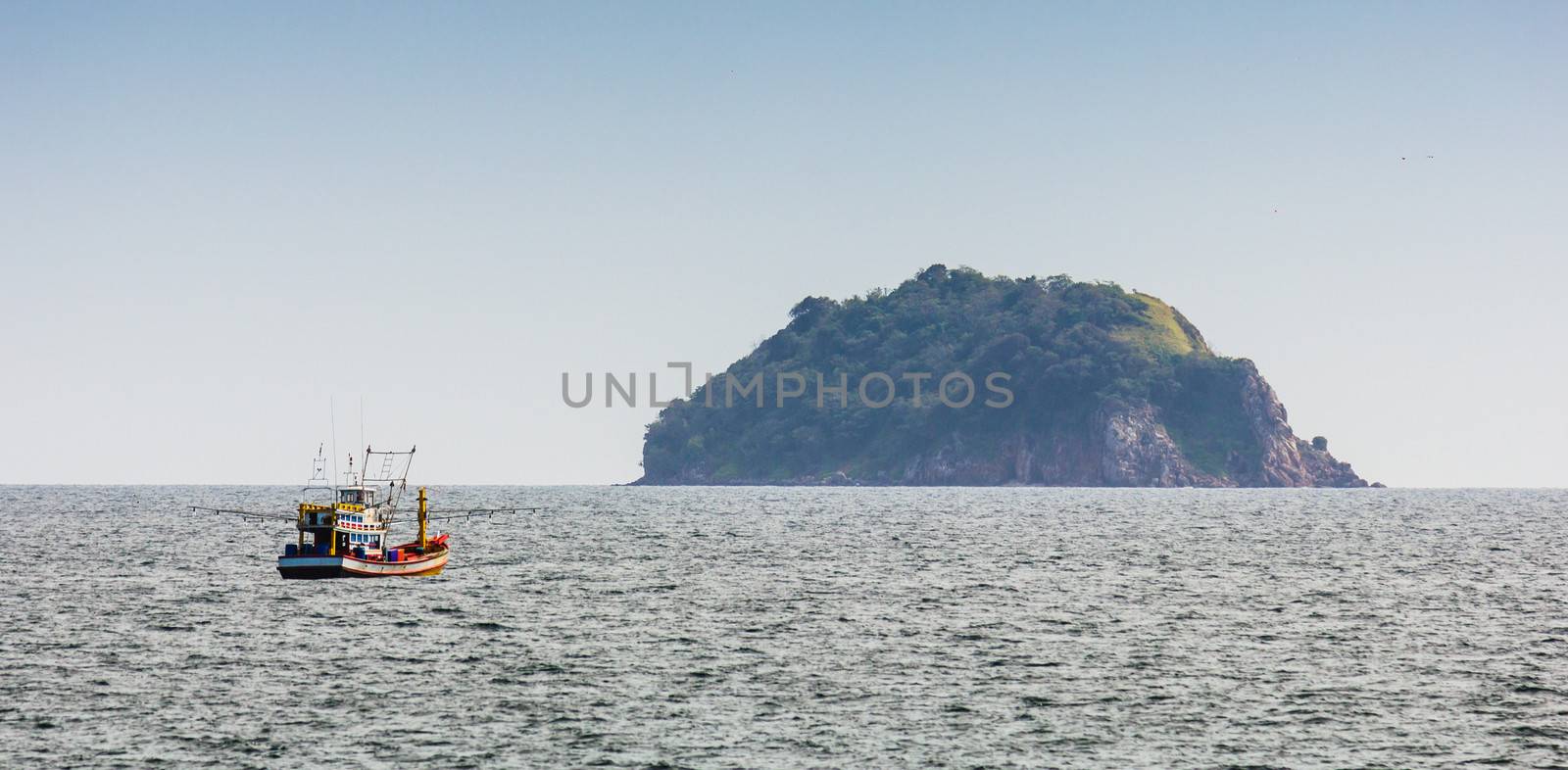 Boats at sea against the rocks in Thailand by oleg_zhukov
