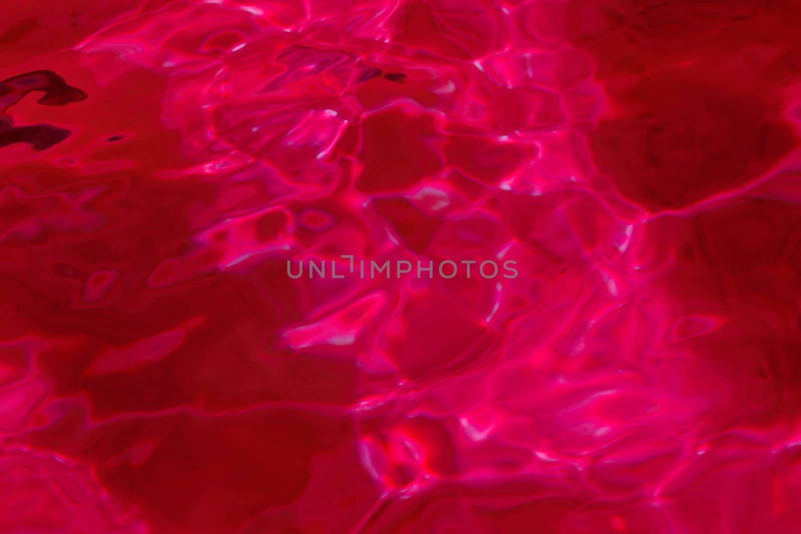 red abstract background of water surface by NagyDodo