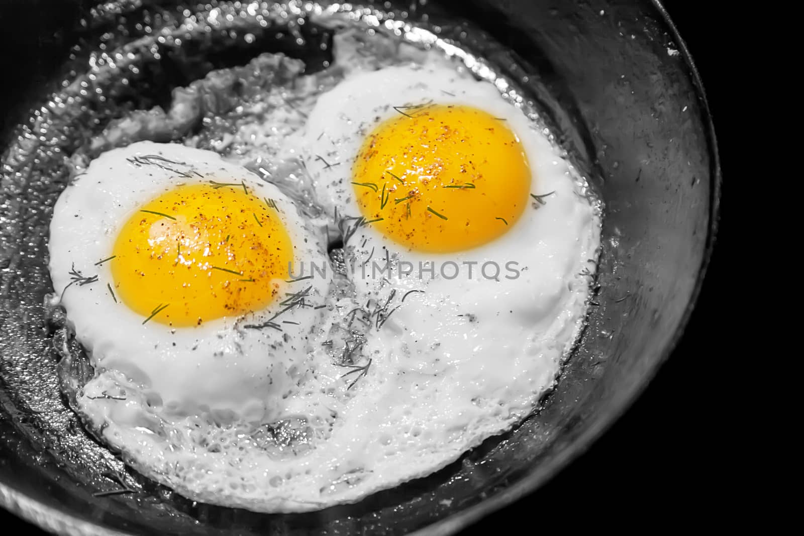 Eggs in a cast iron skillet prepared to perfection