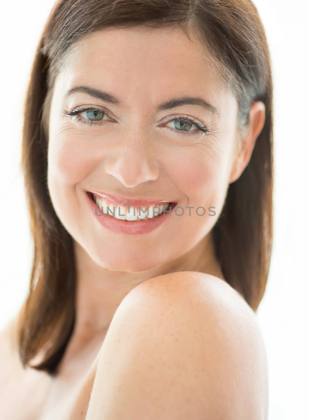 portrait of beautiful mature lady looking at the camera with a confident smile