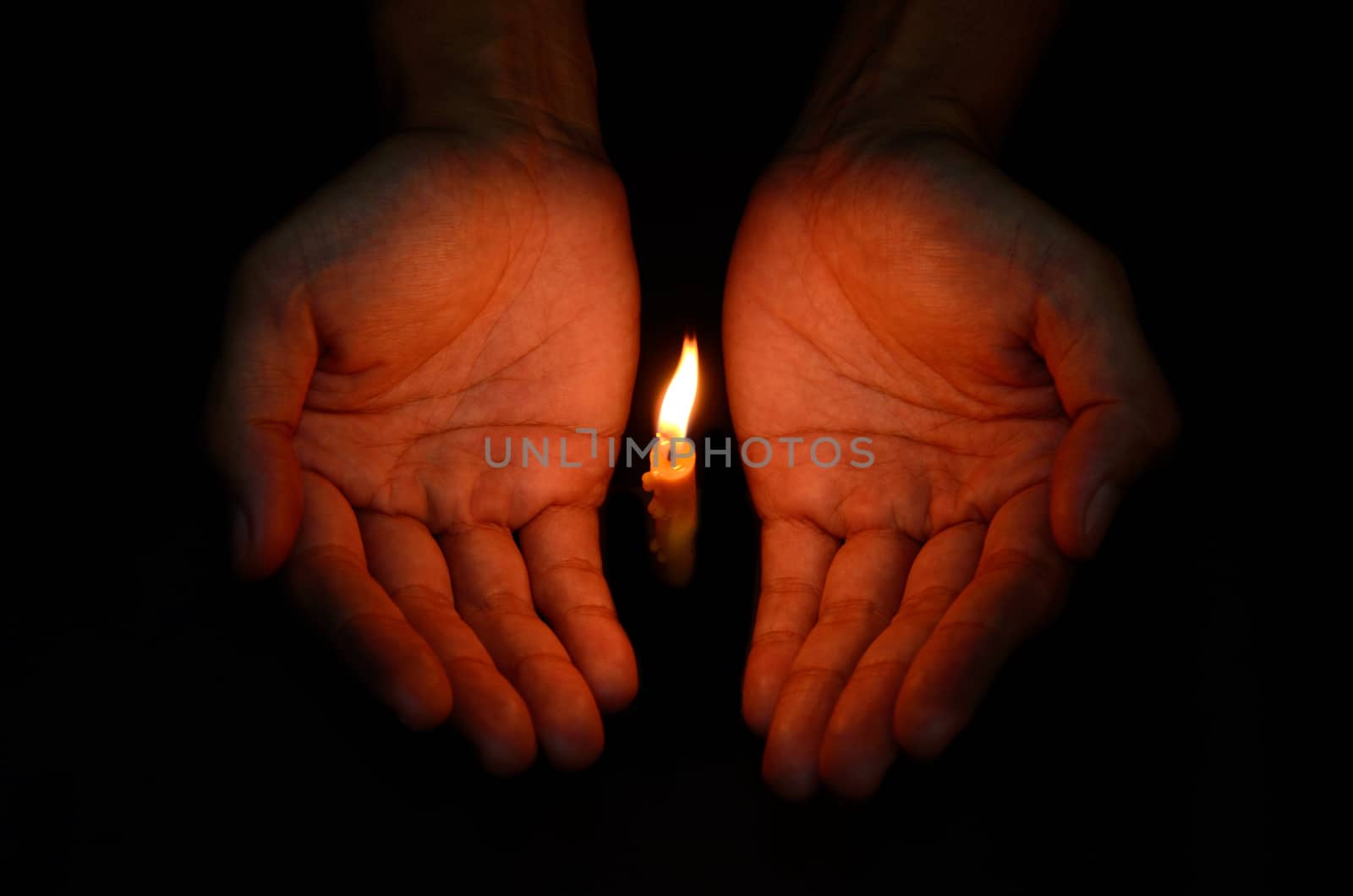Candle light in hand, Pray concept