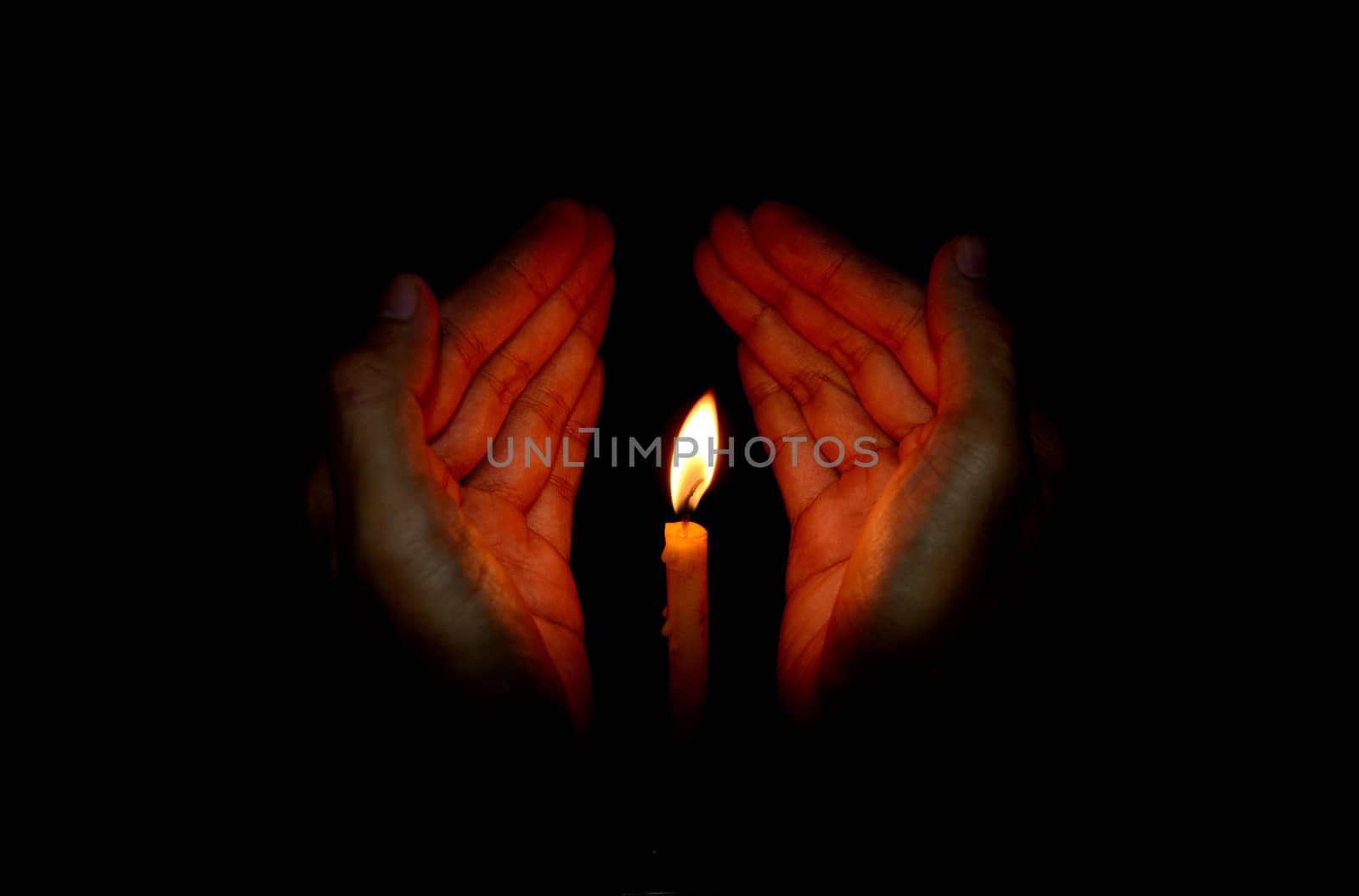 Candle light in hand, Pray concept