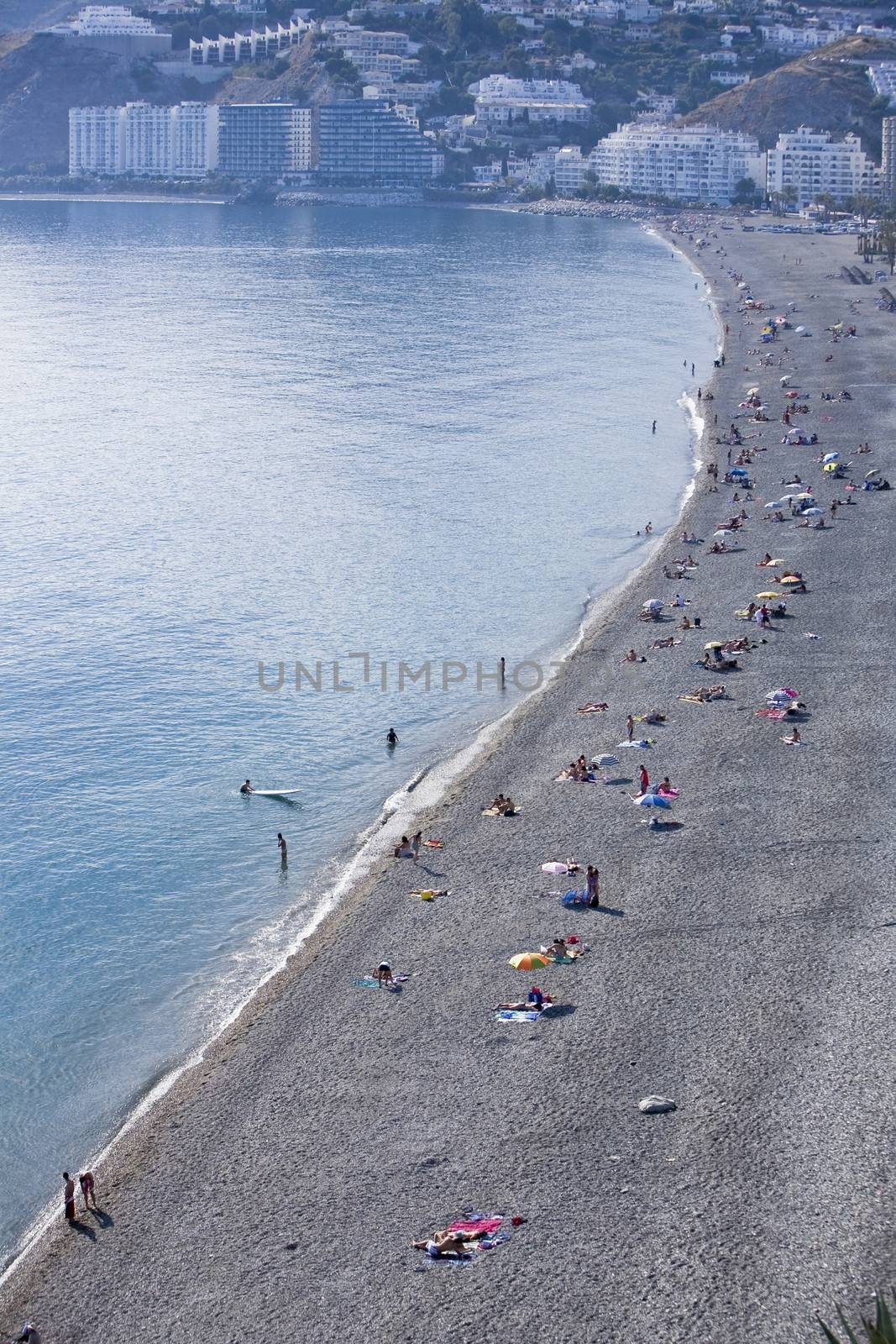 People enjoying the beach at Almunecar, Spain
