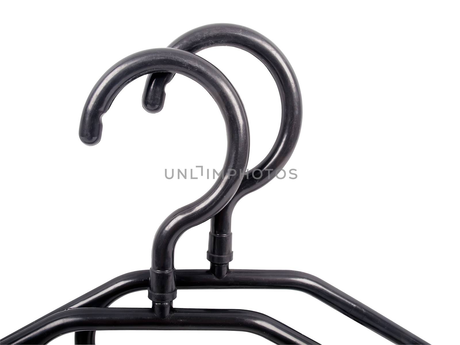 black hangers, upside parts of plastic black hangers isolated on white background