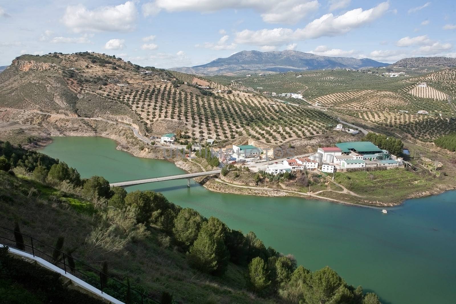 It was inaugurated on June 3, 1969, and belongs to the Guadalquivir hydrographic Confederation. The main tributary of the river Guadalquivir, the Genil, becomes Iznajar in the largest swamp in Andalusia.