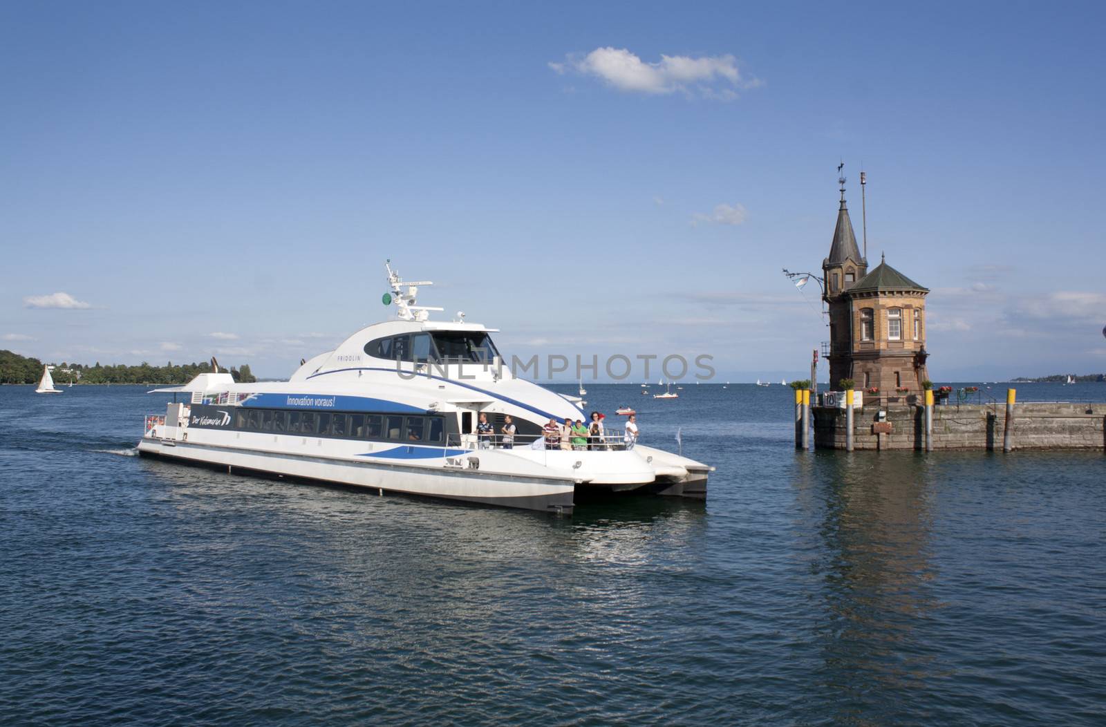 lake of constance with view to constance and a passenger ship 