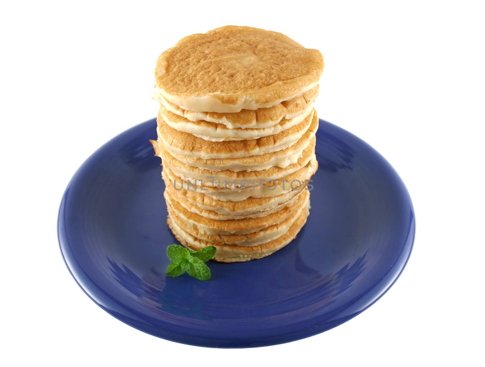 Stack of freshly cooked pancakes ready to serve.