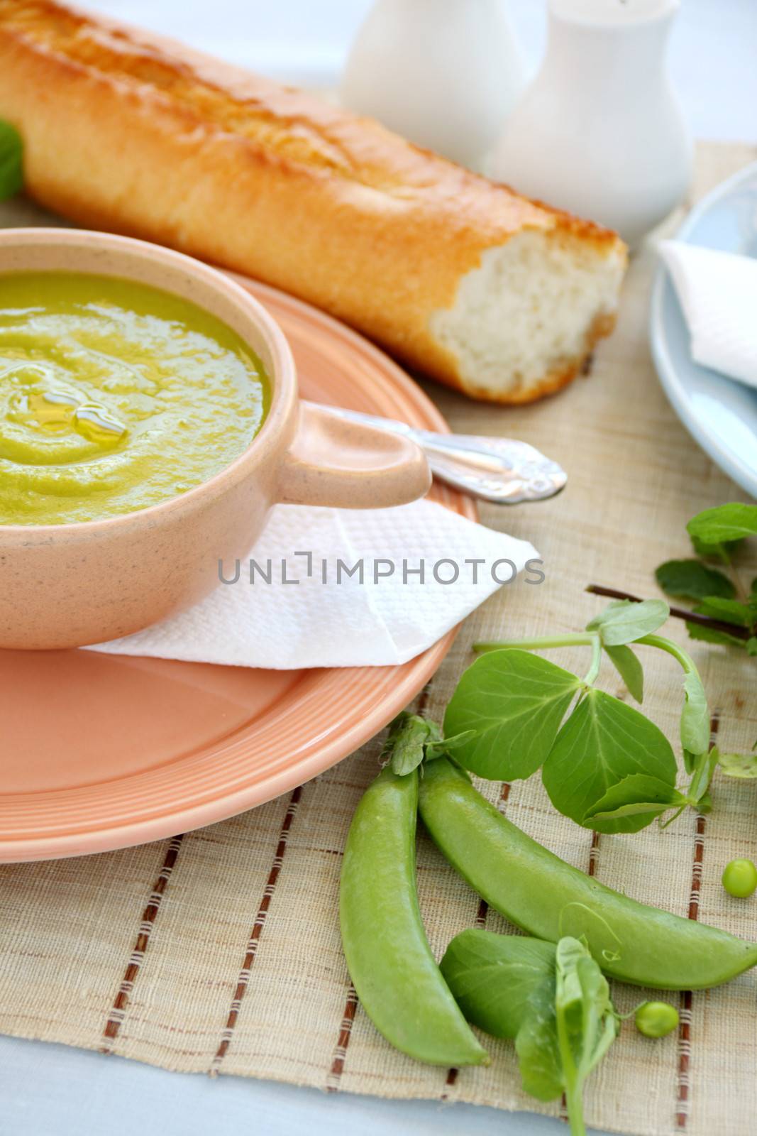 Delicious pea soup with fresh mint and crusty bread.