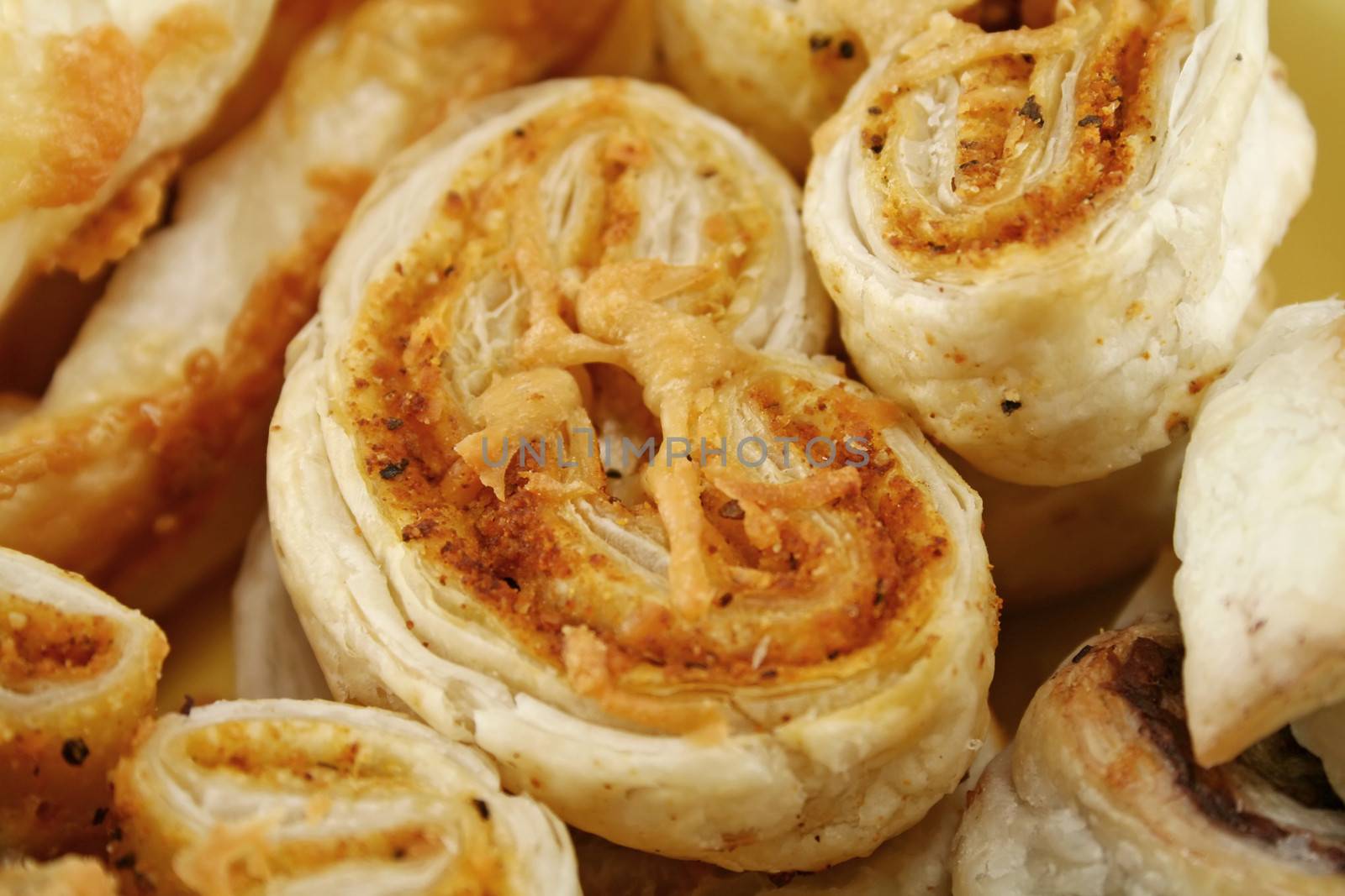 Pesto and parmesan pastries with other assorted pastries.