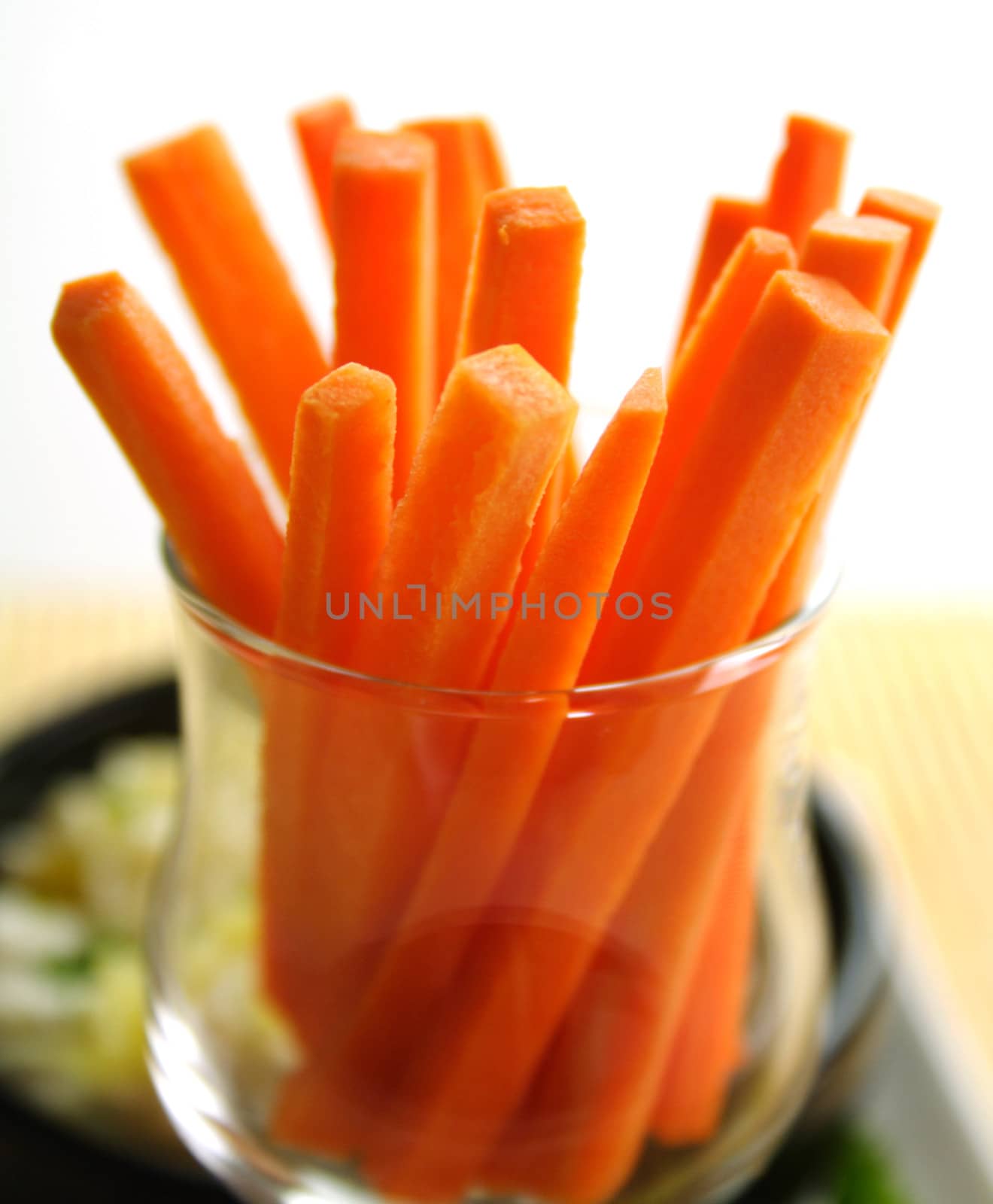 Julienne carrots in a glass ready to serve.
