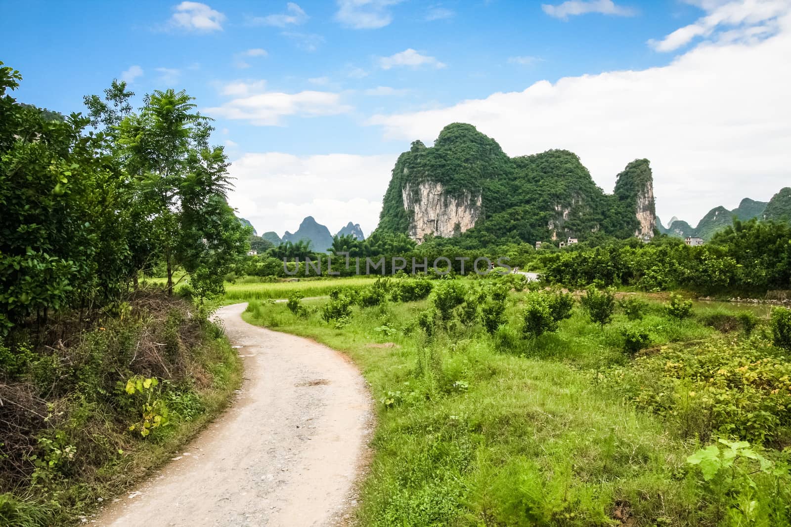Road leading to limestone mountain in china