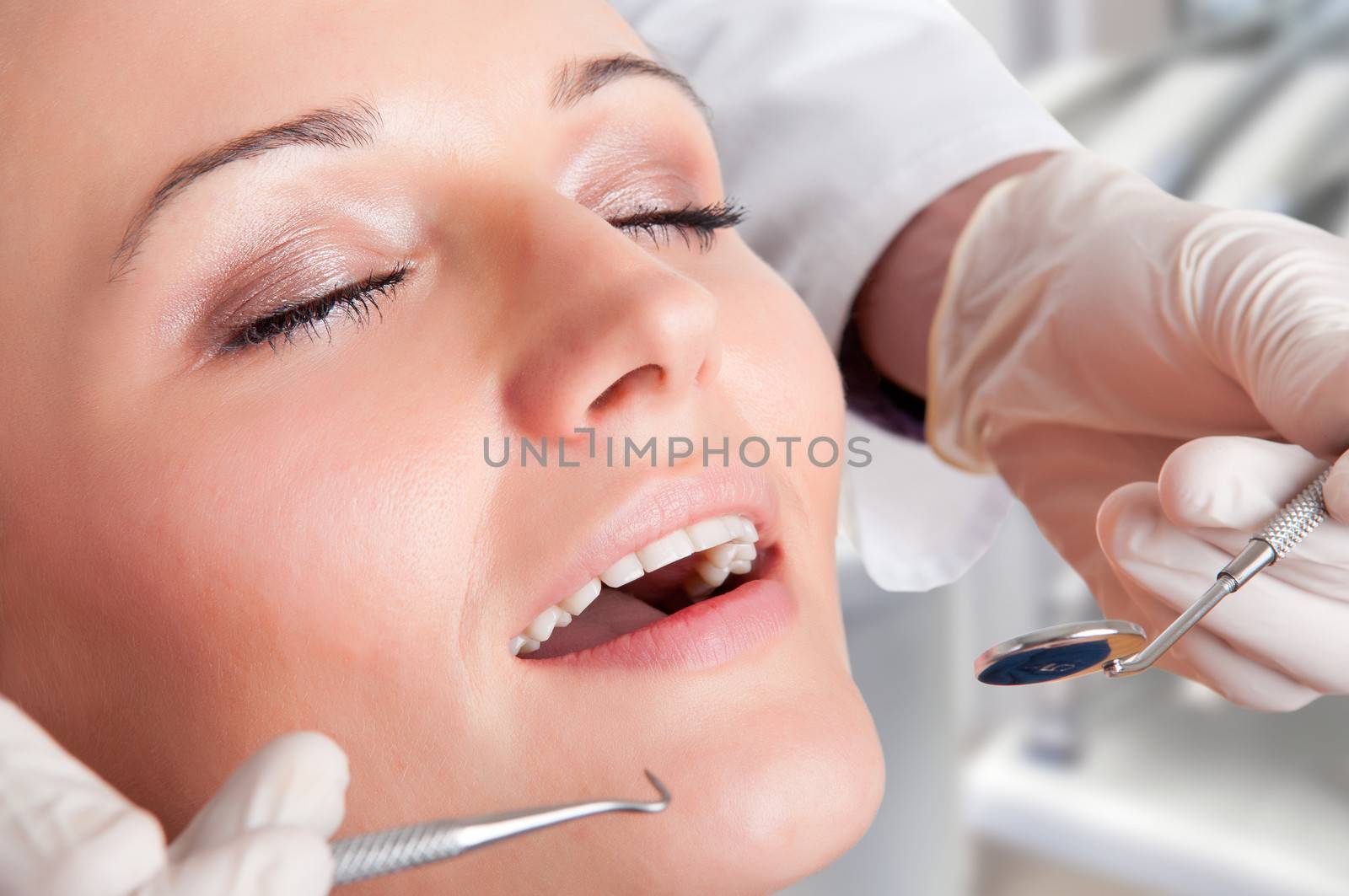 Close-Up of a Dentist at Work by ruigsantos