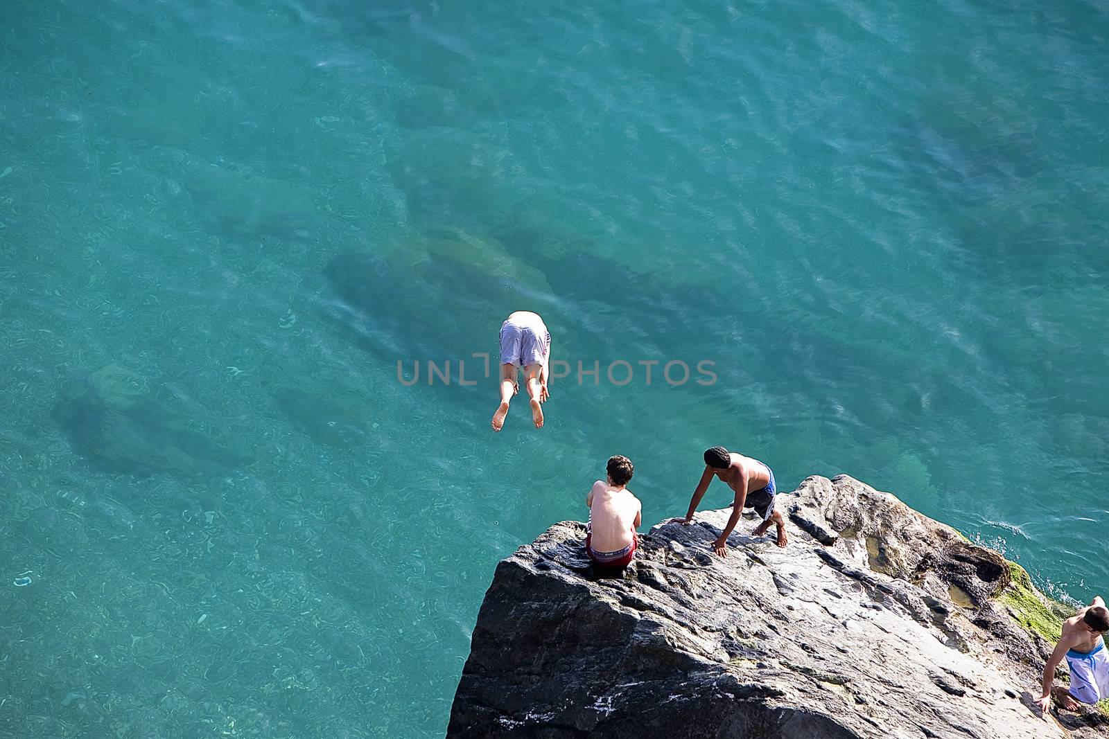 Refreshing images of boys enjoying the sea, Almuñecar, Granada province, Spain