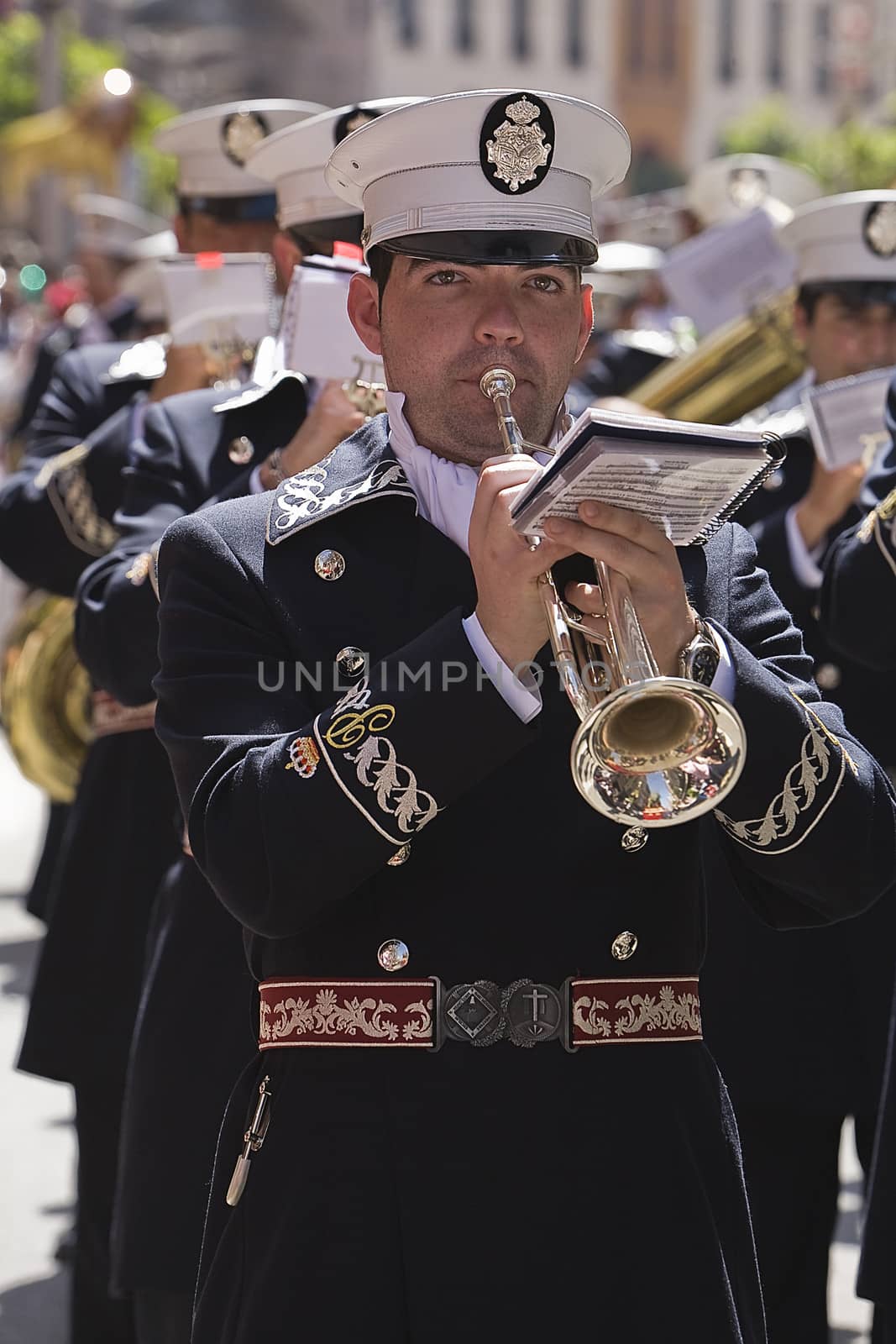 Brass band musicians, Palm Sunday, this band wears the uniform of Captain of Squad of the Royal escort of Alfonso XIII, Linares, Jaen province,  Spain