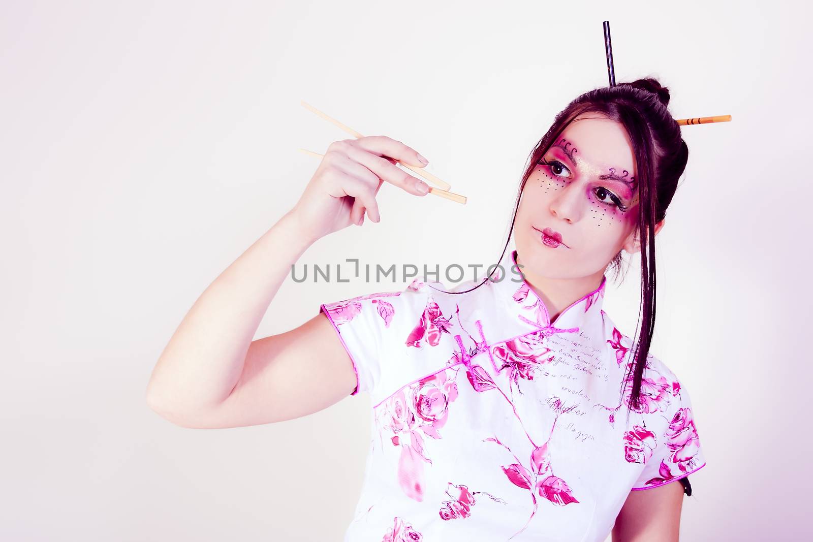 portrait of geisha with chopsticks