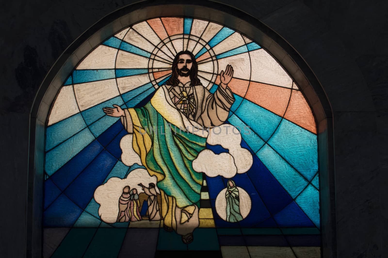 stained glass image of Christ taken in a public park