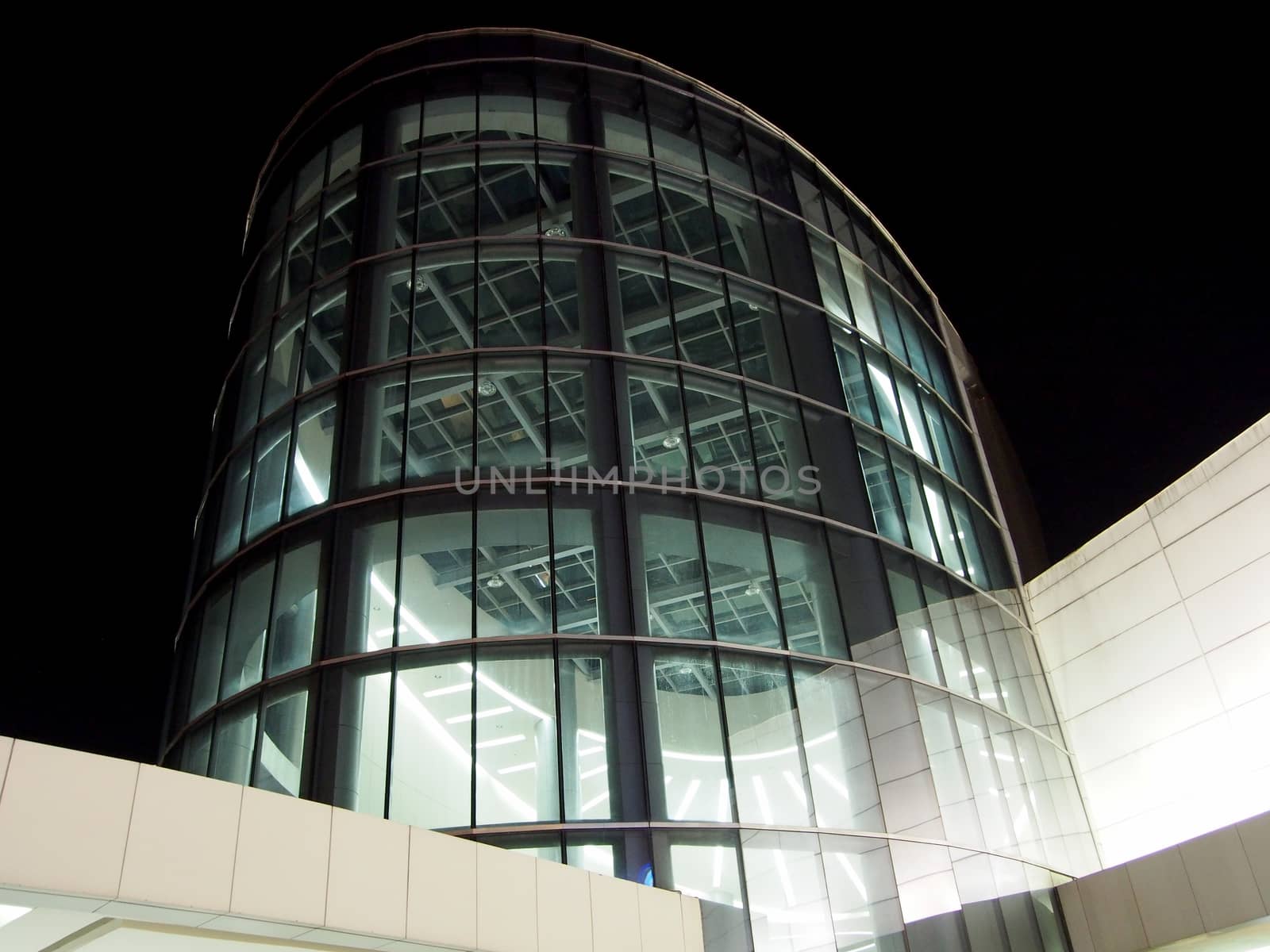 shot of glass see through building taken at night