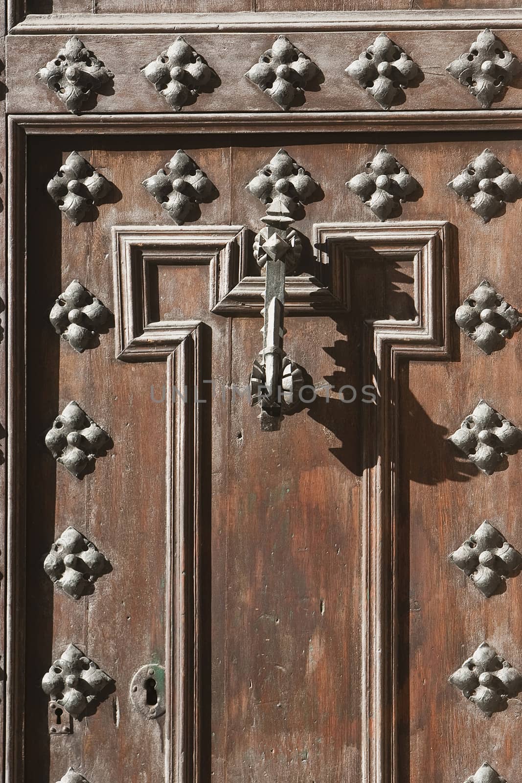 an old metal door handle knocker, Spain