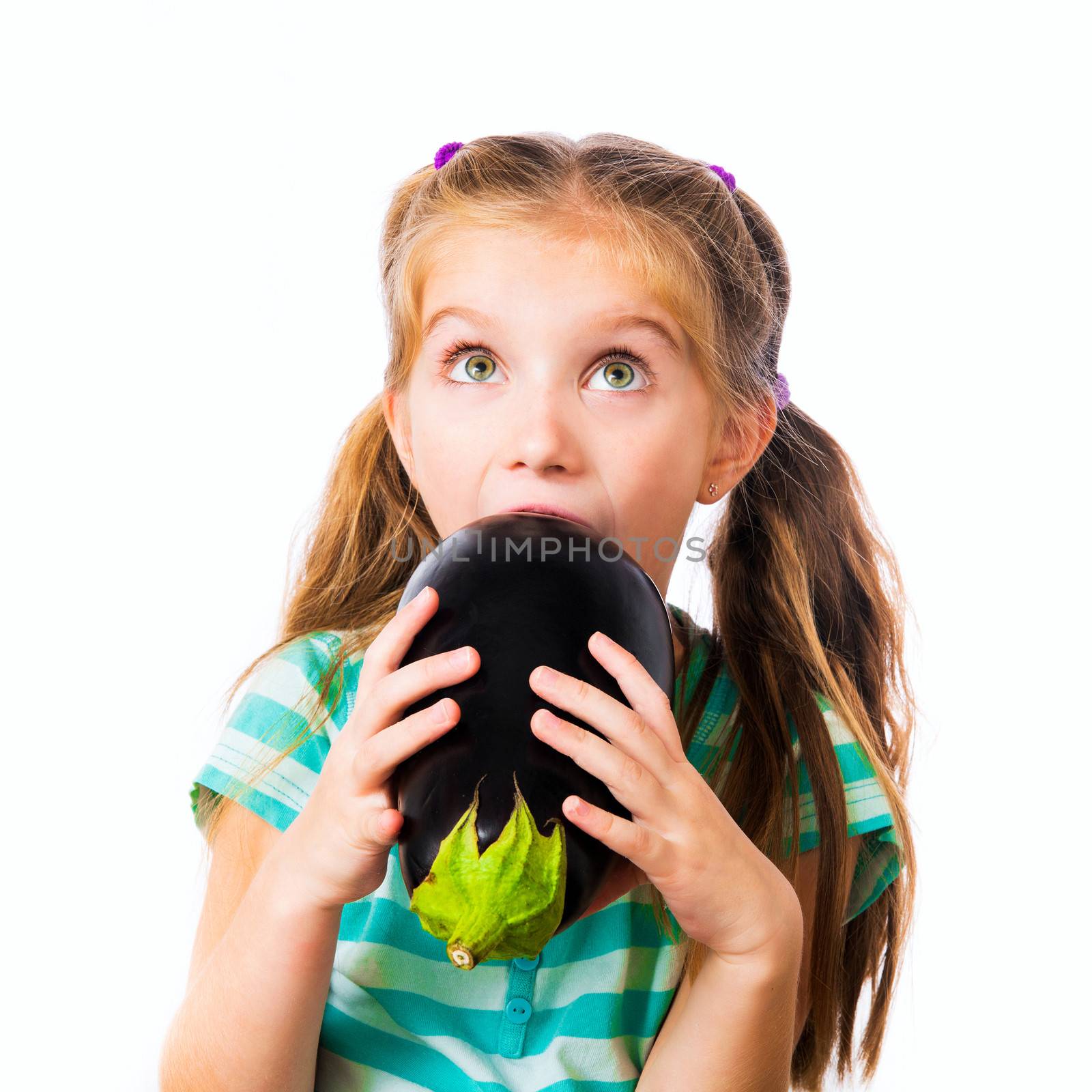 little girl with eggplant isolated on a white background