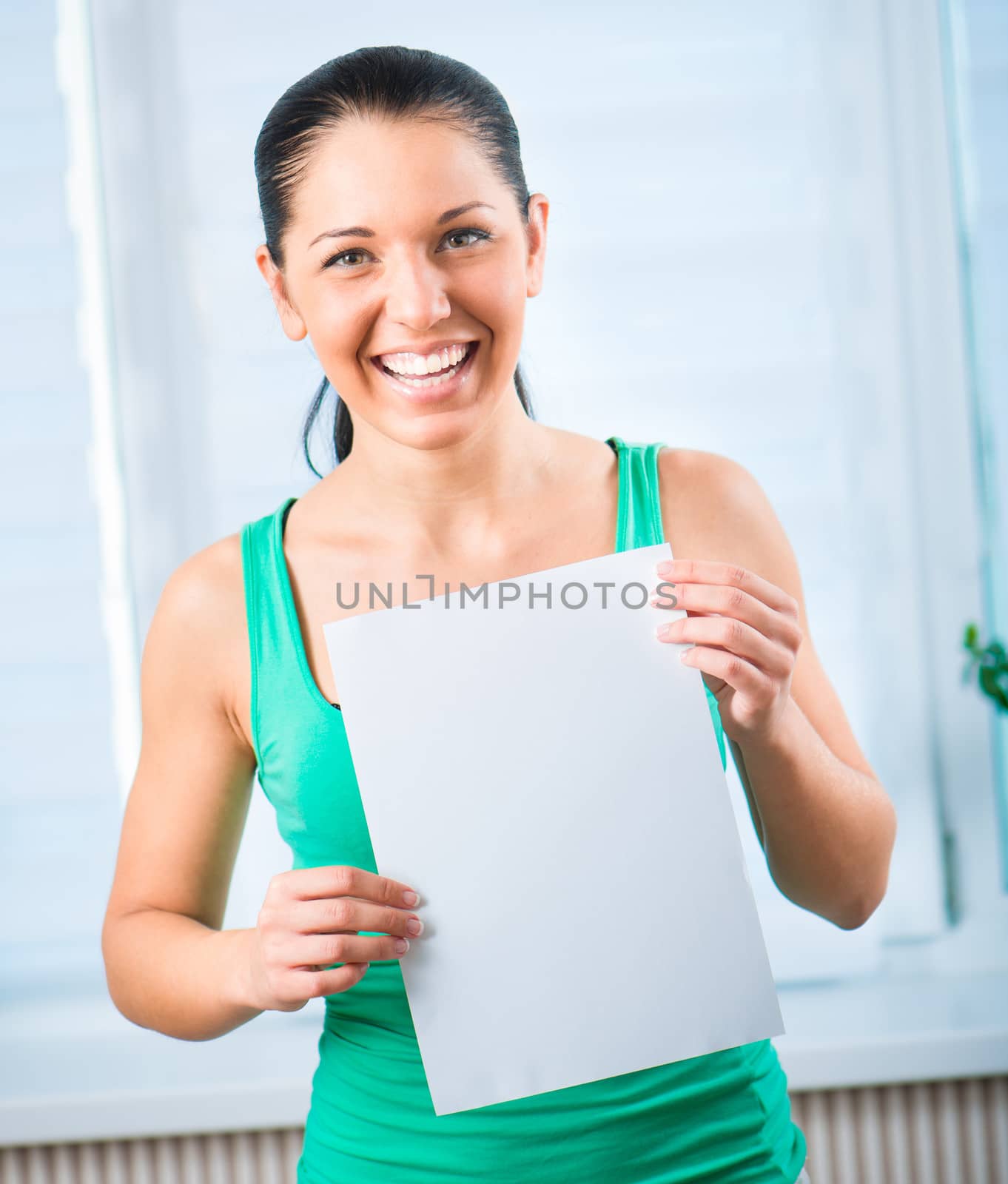 young woman holding a blank by GekaSkr
