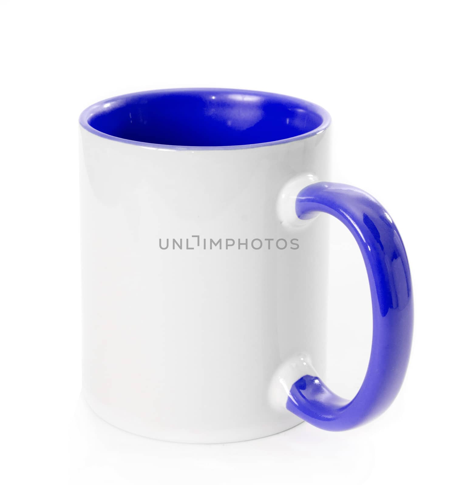 white cup with a blue handle and the inner surface isolated
