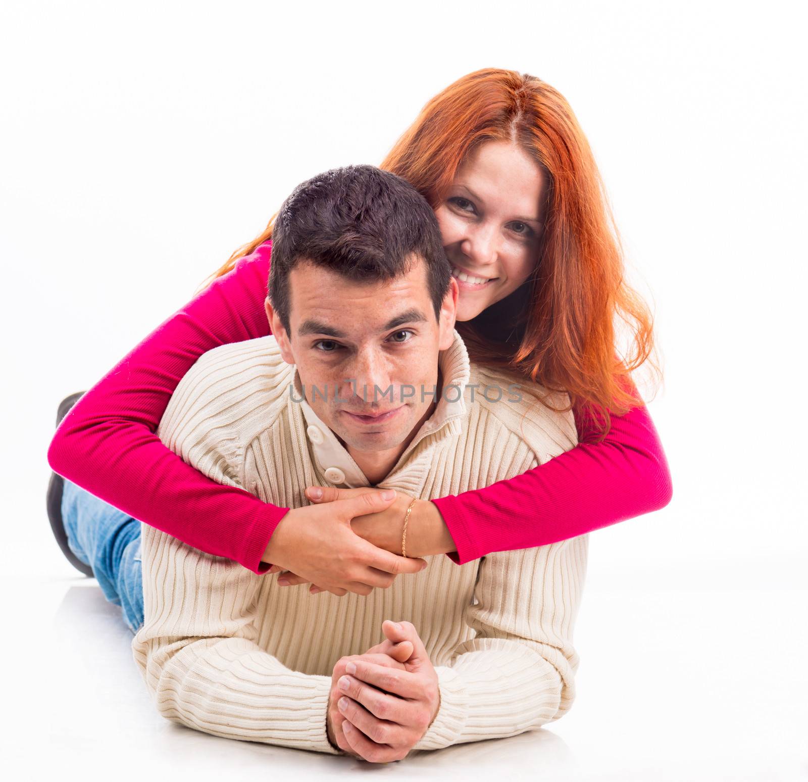 beautiful young couple isolated on a white background