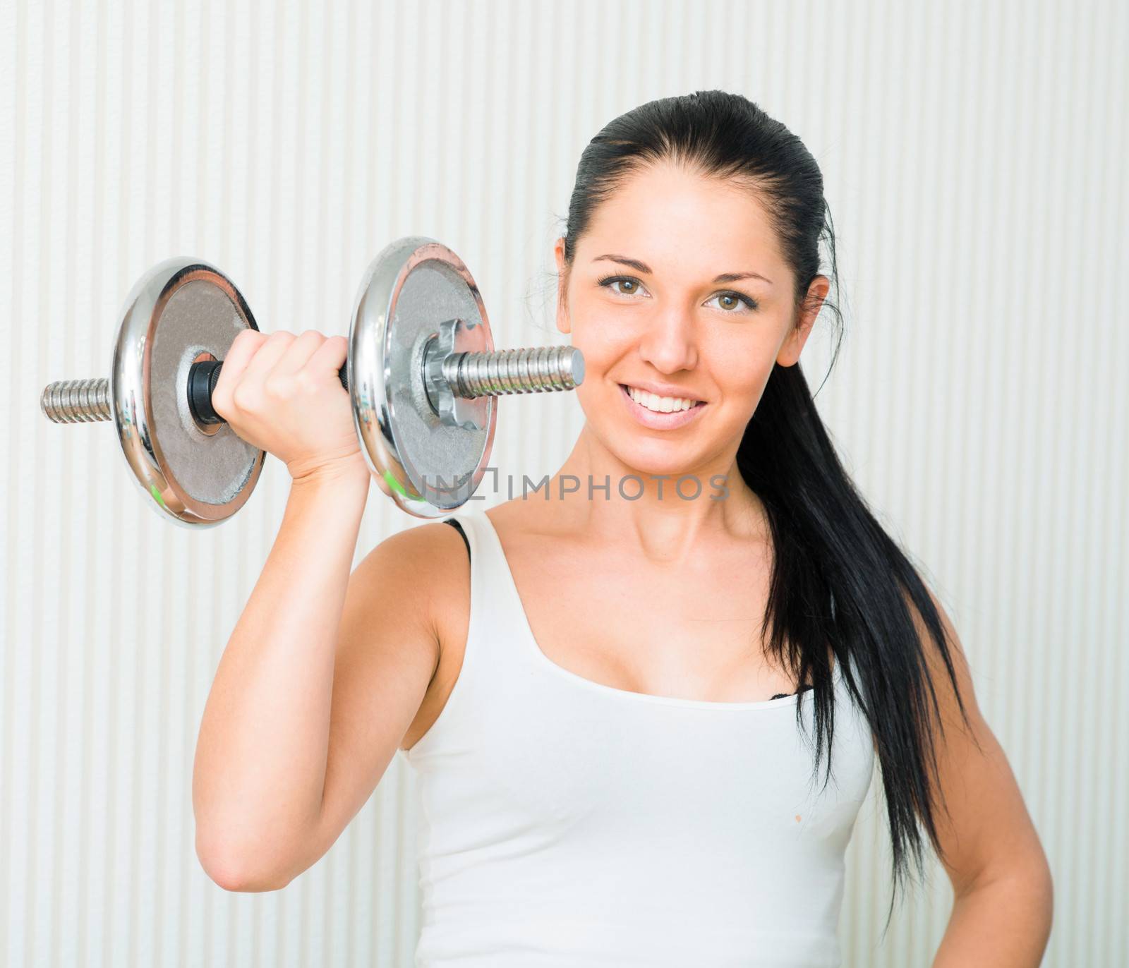 fitness woman working out with dumbbell