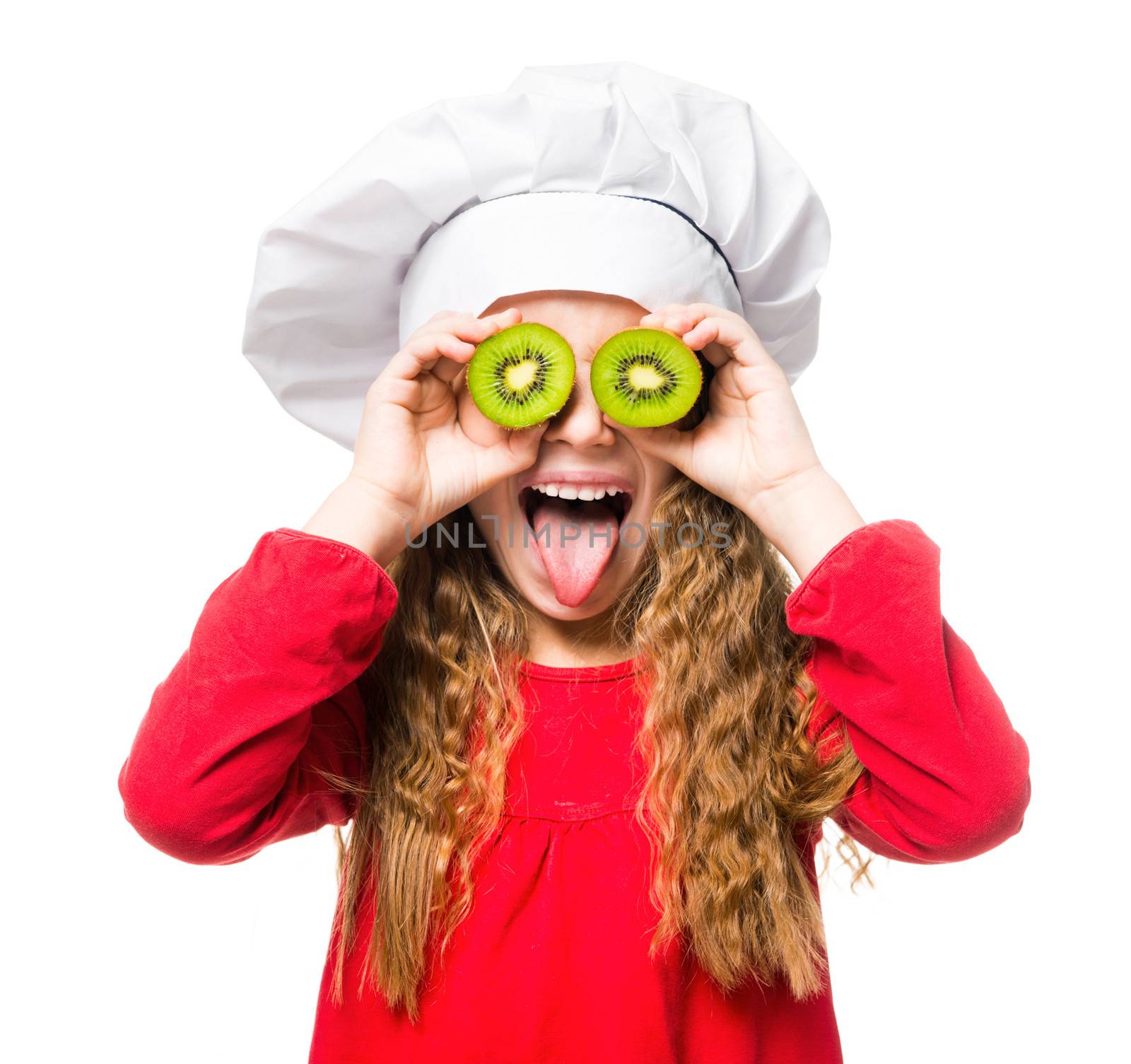 little girl in chef hat with dvemya rugs kiwi on eyes shows tongue