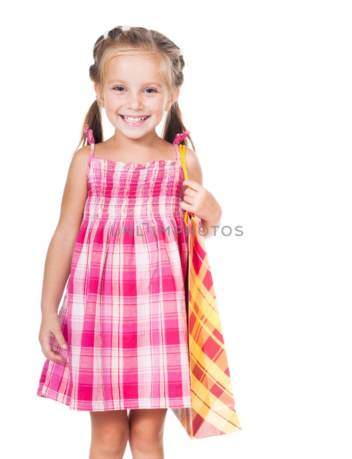 beautiful little girl with shopping bag isolated on white background