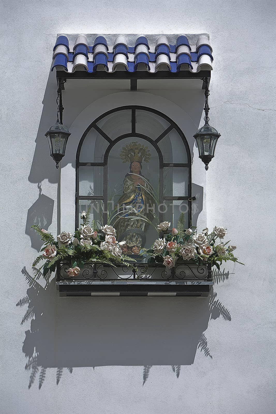 Small altarpiece of a virgin in the street, typical of the street in Osuna, Sevilla province, Andalusia, Spain