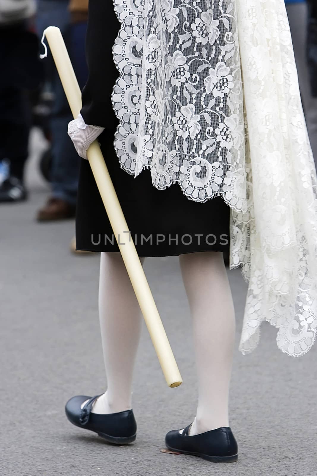 Woman dressed in mantilla during a procession of holy week, Spain