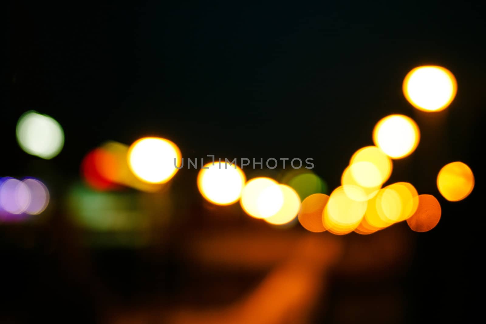 Abstract defocused lights of the night city bokeh background