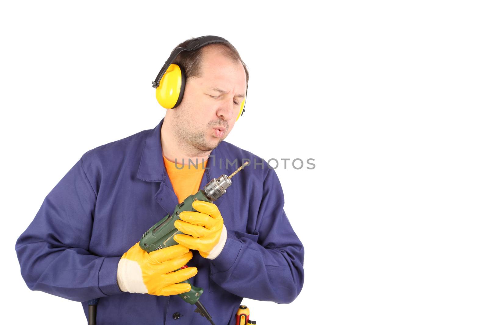 Worker in ear muffs with drill. Isolated on a white backgropund.