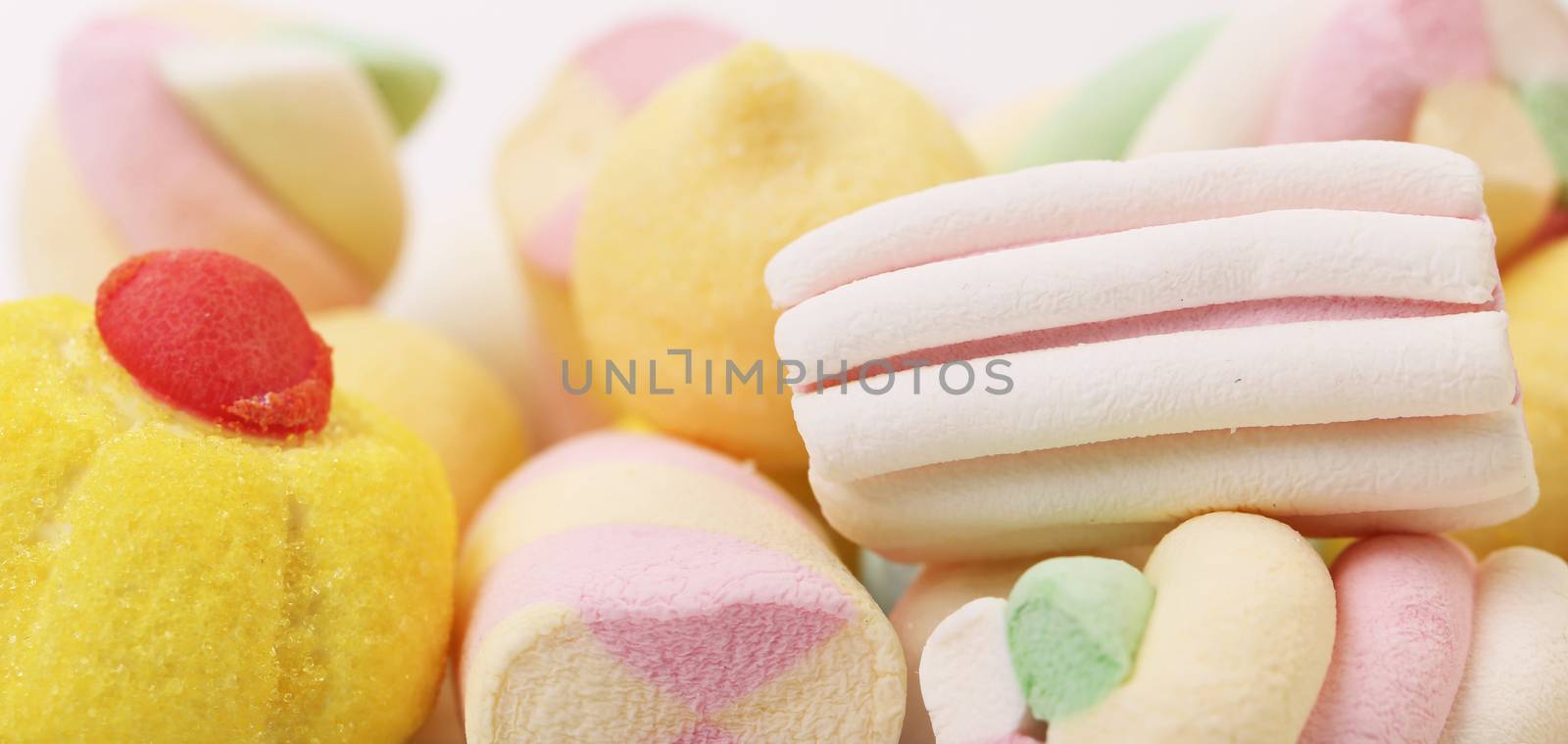 Different colorful marshmallow. by indigolotos
