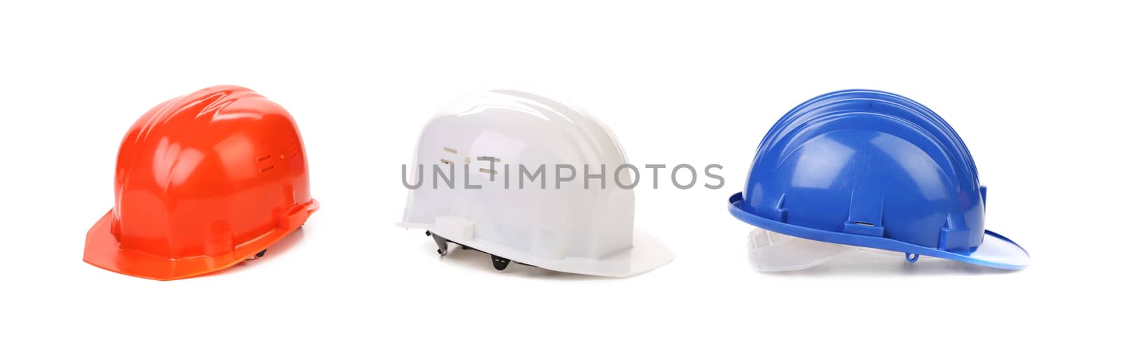 White red and blue hard hats. Isolated on a white background.