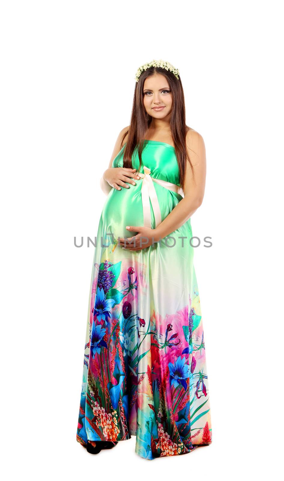 Beautiful pregnant girl in a summer dress