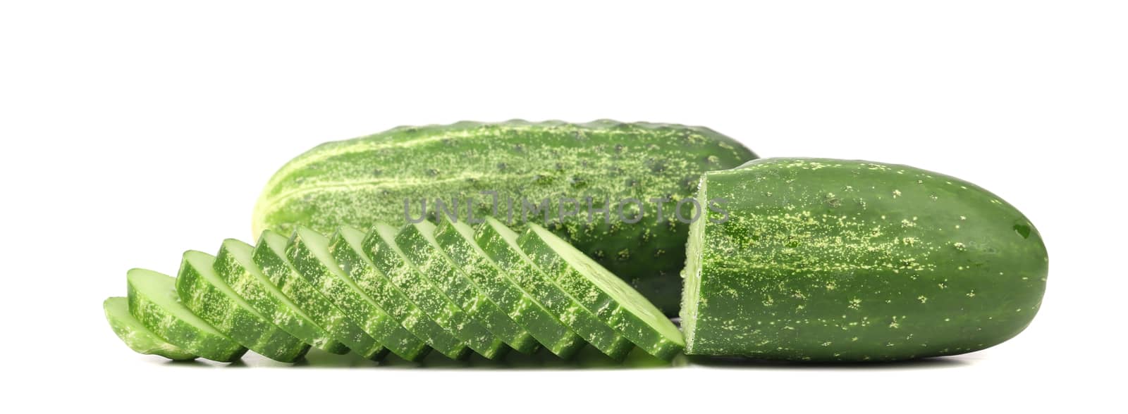 Fresh cucumbers and slices. Isolated on a white background