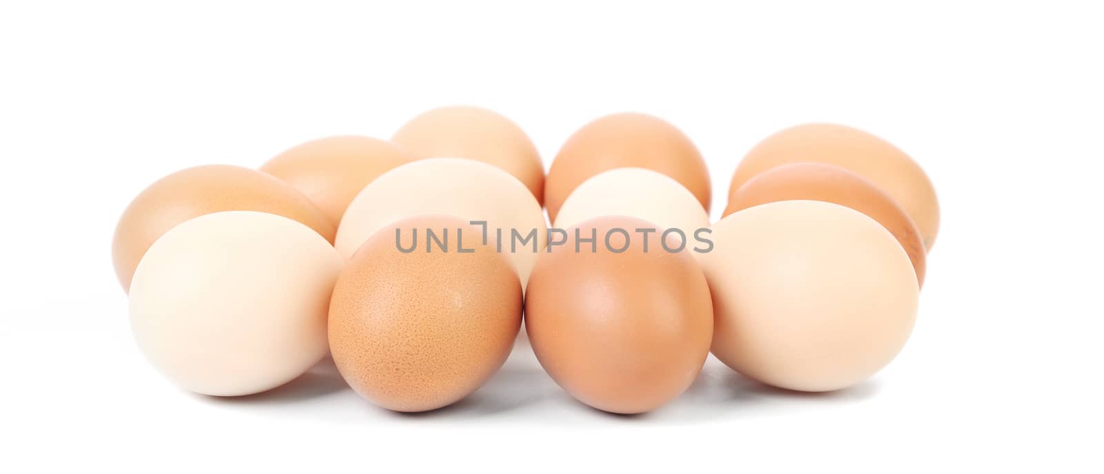 Brown and white eggs. Isolated on a white background.