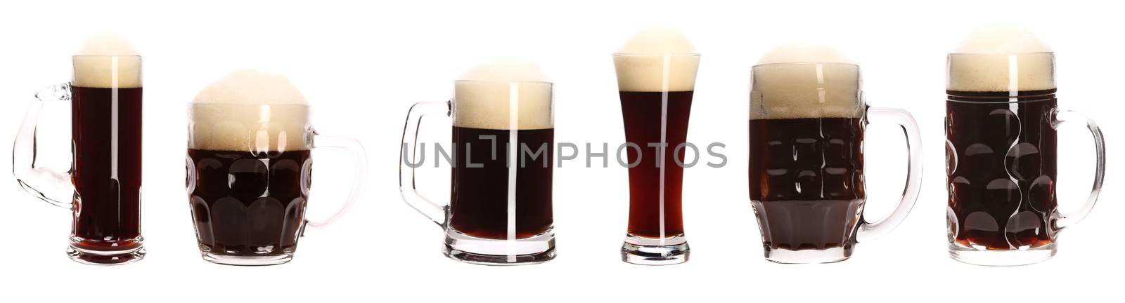 Close up of various beer mugs. Isolated on a white background.