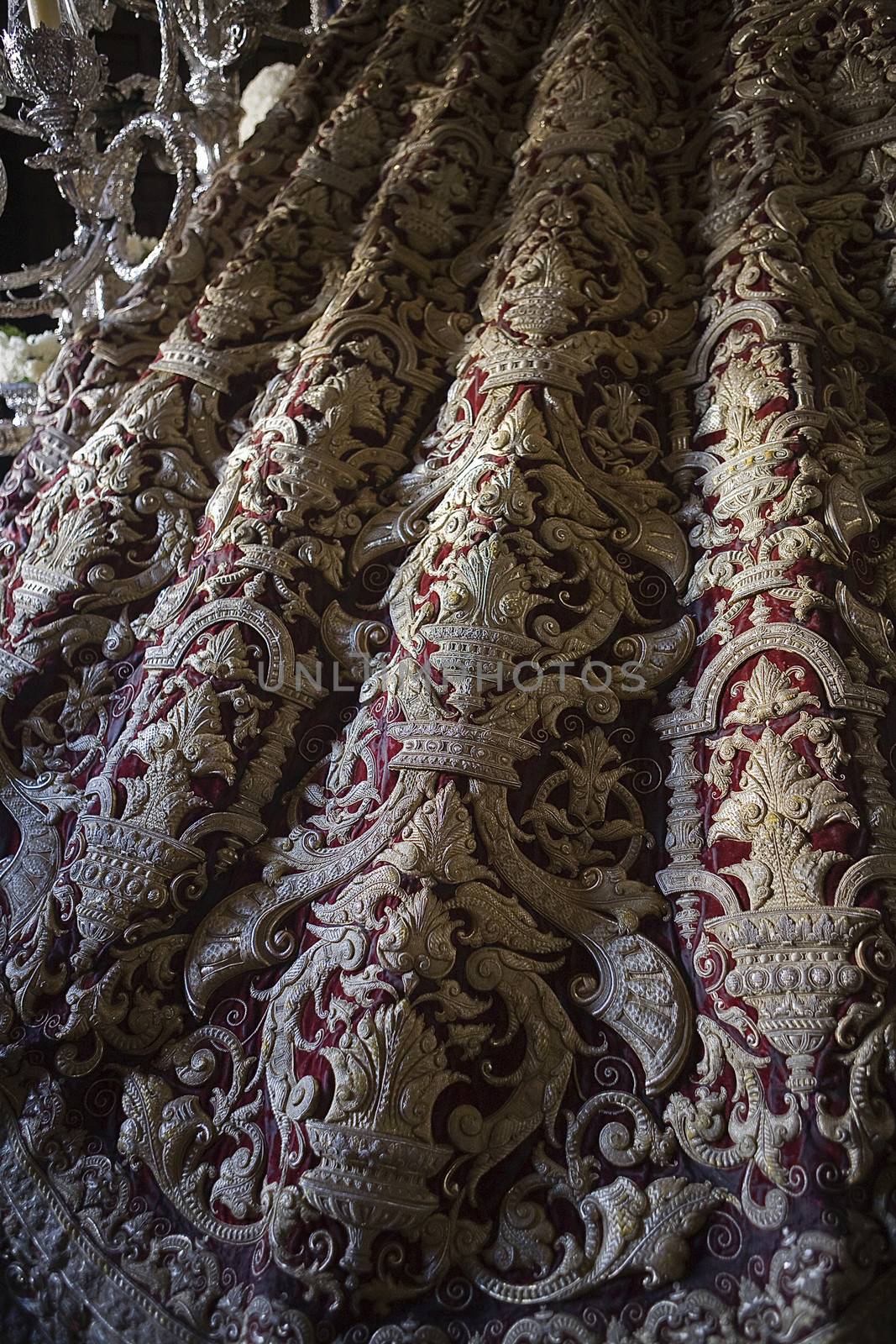 Detail the Virgin's mantle embroidered on red velvet, Seville, Andalusia, Spain